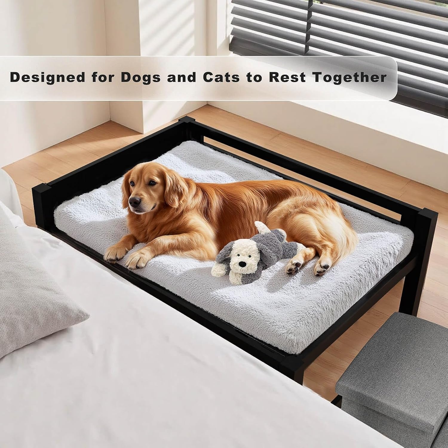 Black wood pet co-sleeper beside a window with a large dog on the gray padded mattress and the three-step stairs at the side