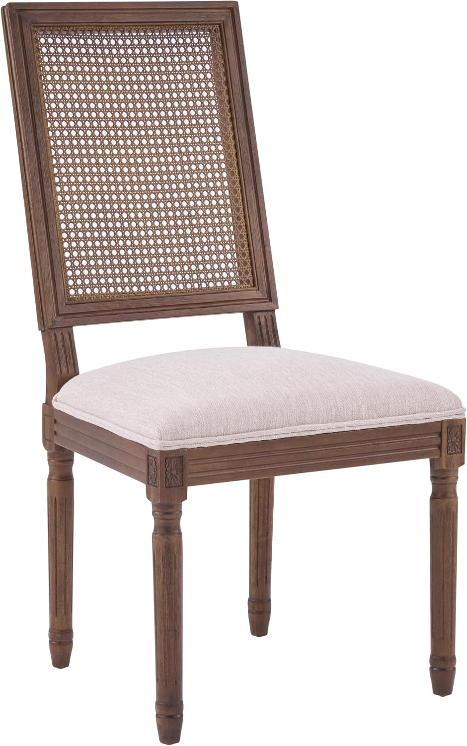 Three-quarter angled view of the chair highlighting turned legs, carved corner details and cane backrest.