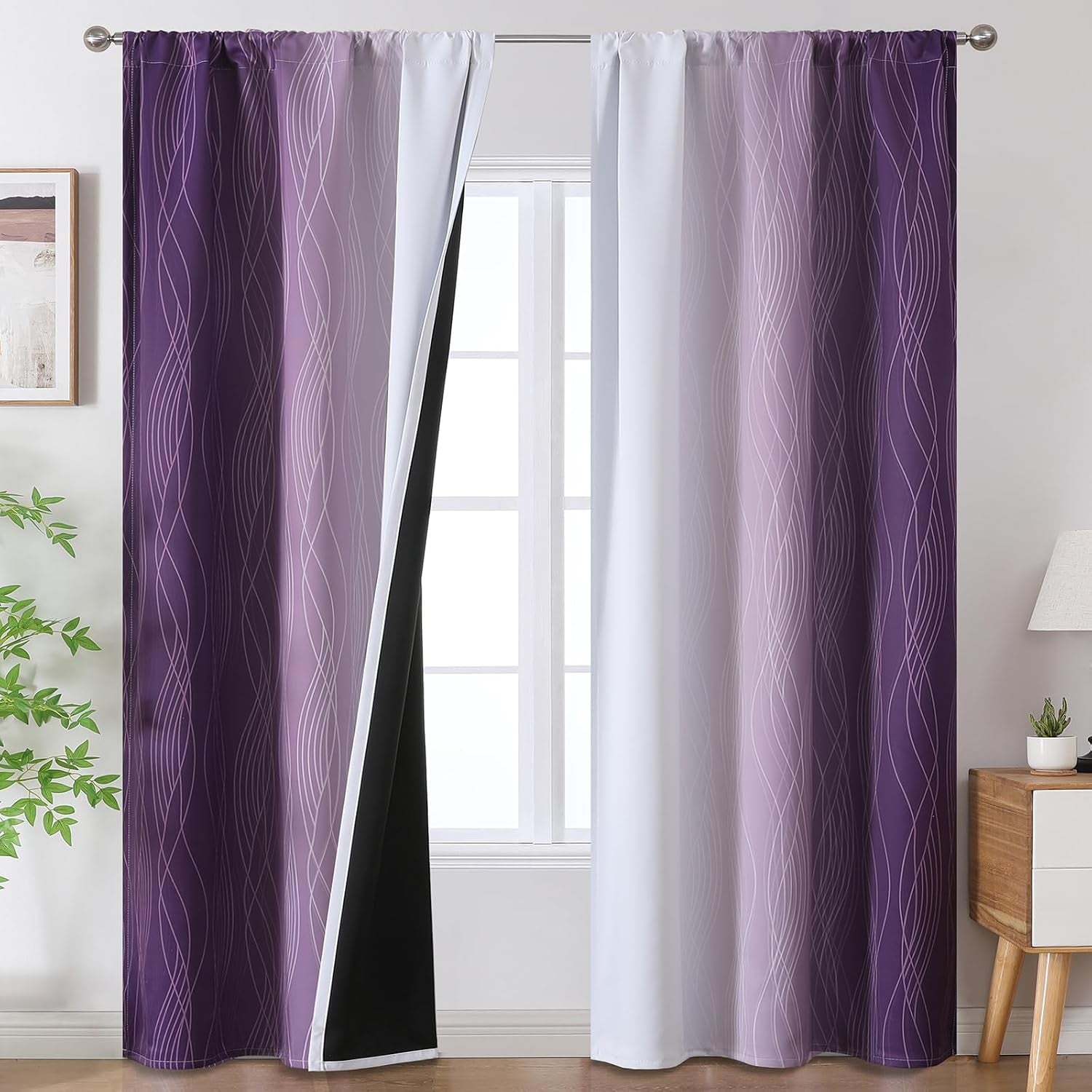 Pair of purple ombre rod-pocket curtains with white inner panels and visible black backing at the seam.