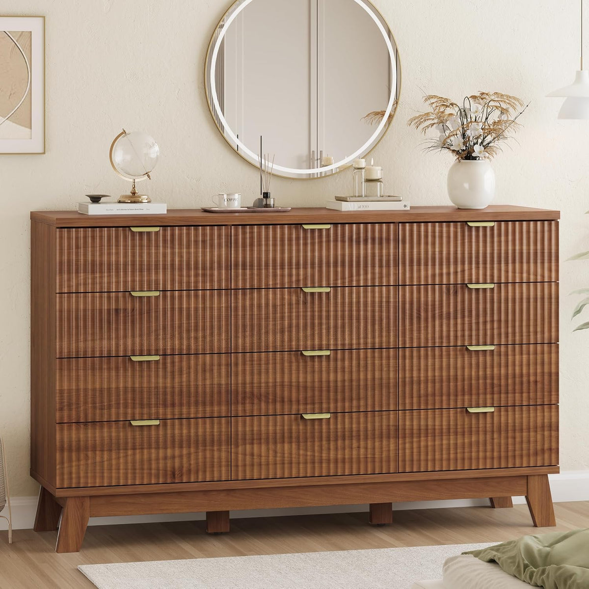 Front view of a wide wood-finish nine-drawer dresser beneath a round mirror, styled with a globe and vase on top.