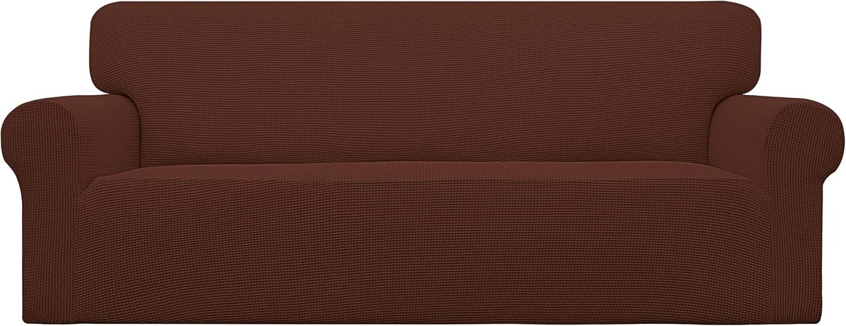 Front-facing two-seat loveseat dressed in a warm brick-brown textured slipcover