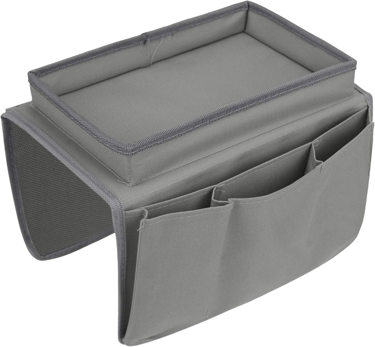 Gray fabric armrest caddy showing quilted top tray and three front pockets in close view