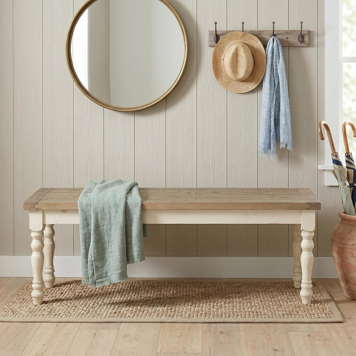 Front-facing view of the matching bench showing the turned legs and plank-style distressed oak seat