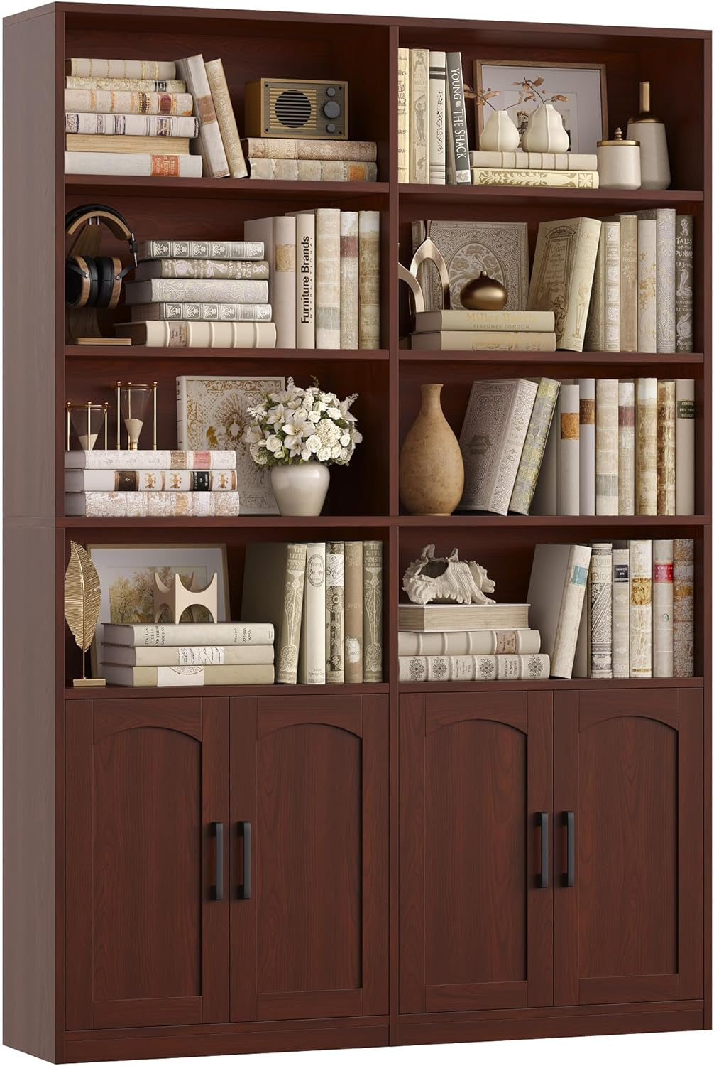 Tall reddish-brown double-wide bookshelf with four paneled doors and books and decor on shelves