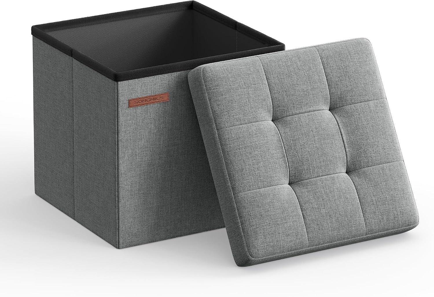 Open light-gray square storage ottoman with a tufted gray lid leaning in front