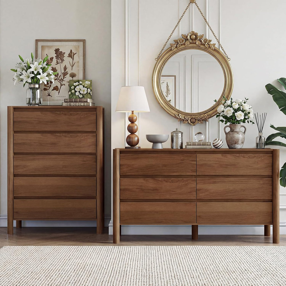 Warm walnut-finish dresser pair with classic wood grain, decorative books and floral arrangement.