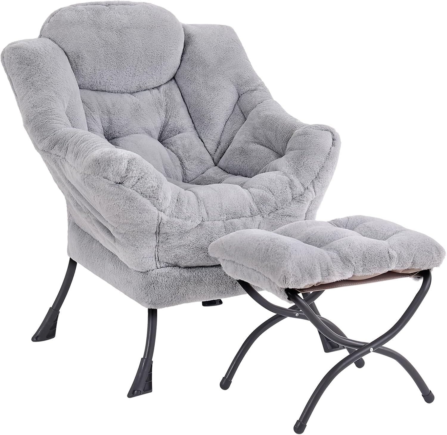 Three-quarter view of a gray plush lounge chair with tufted seat and matching foldable ottoman on dark metal legs.