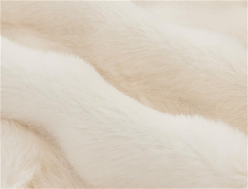 Close-up of cream faux rabbit fur texture showing soft pile and subtle color variation