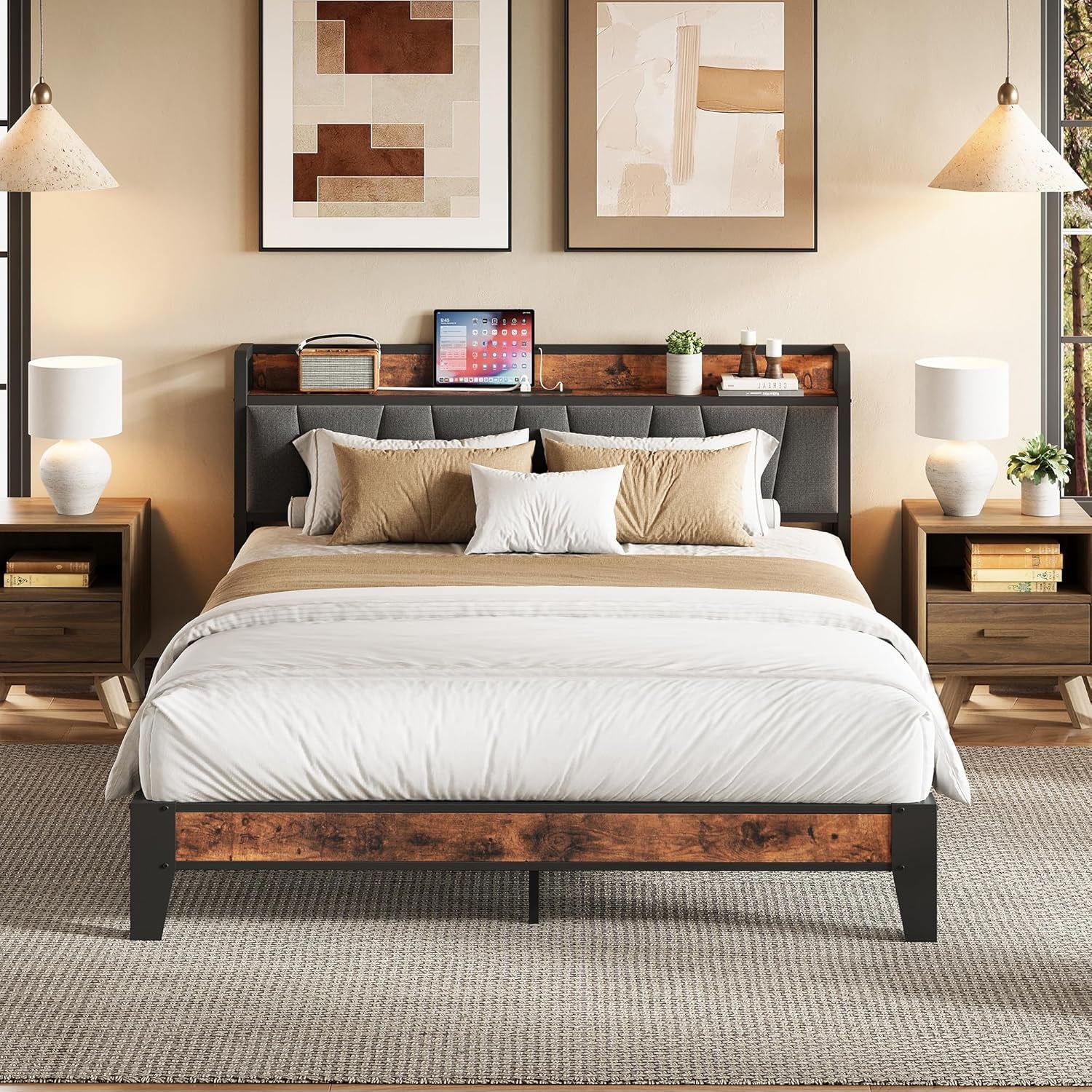 Front view of a king bed with dark gray upholstered headboard and rustic brown wood accents in a styled bedroom.