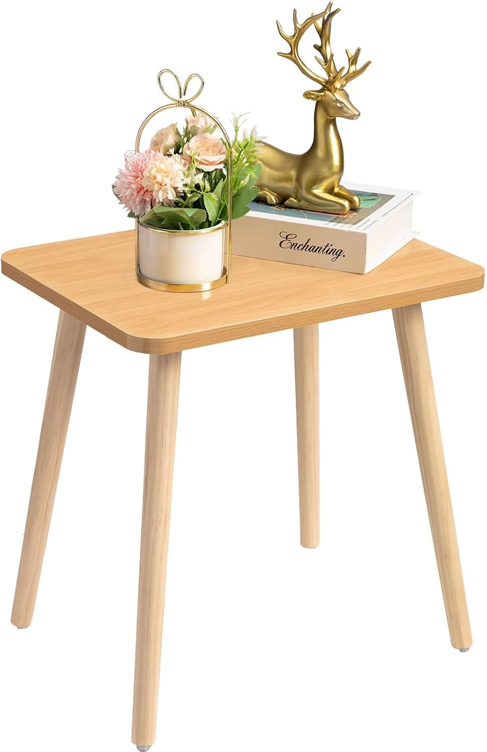 Single small rectangular side table with light natural wood top and tapered natural wood legs, styled with flowers and a book