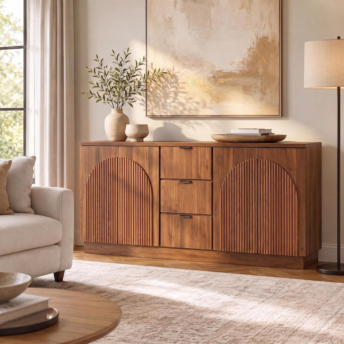 Walnut sideboard with arched reeded doors, angled front view in a bright living room