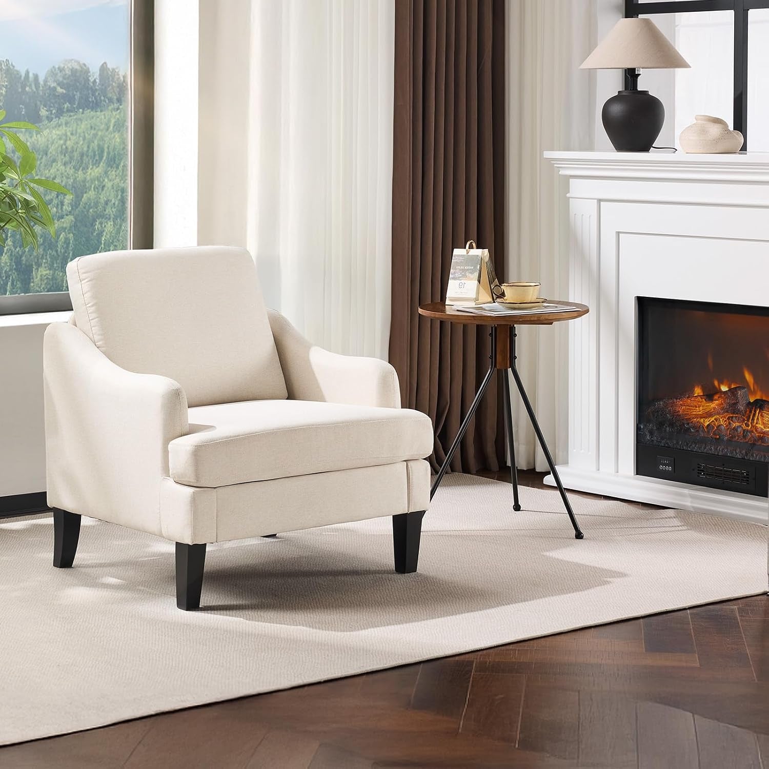 Single beige/cream upholstered armchair staged near a mantel and side table.