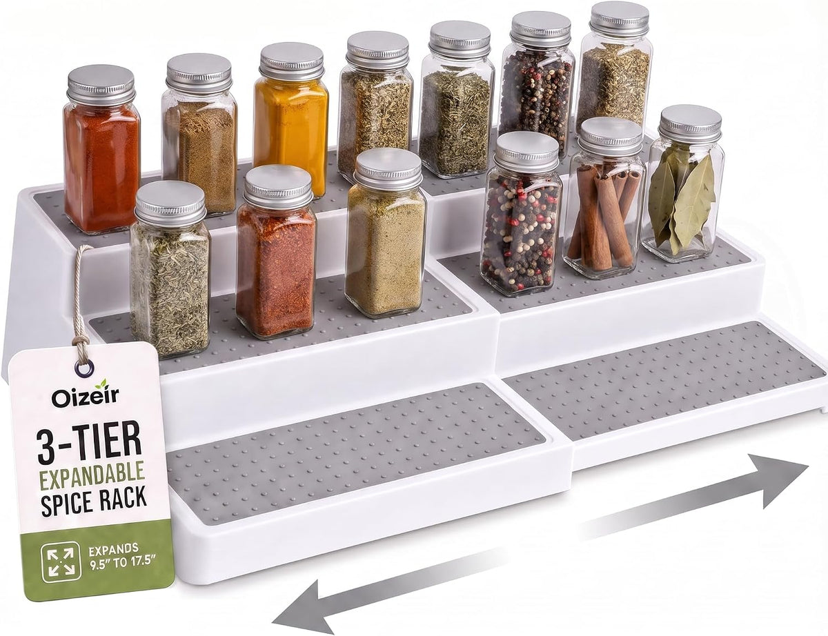 White expandable 3-tier rack shown partially extended on white background with arrow indicating slide