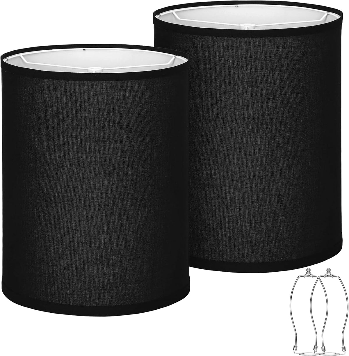 Two black drum lampshades side by side showing textured fabric and white inner lining.
