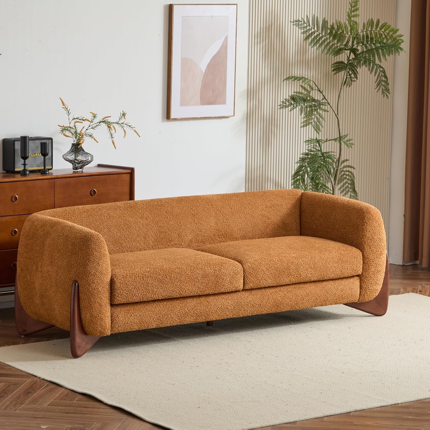 Caramel faux sherpa three-seat sofa angled front-left view in a styled living room
