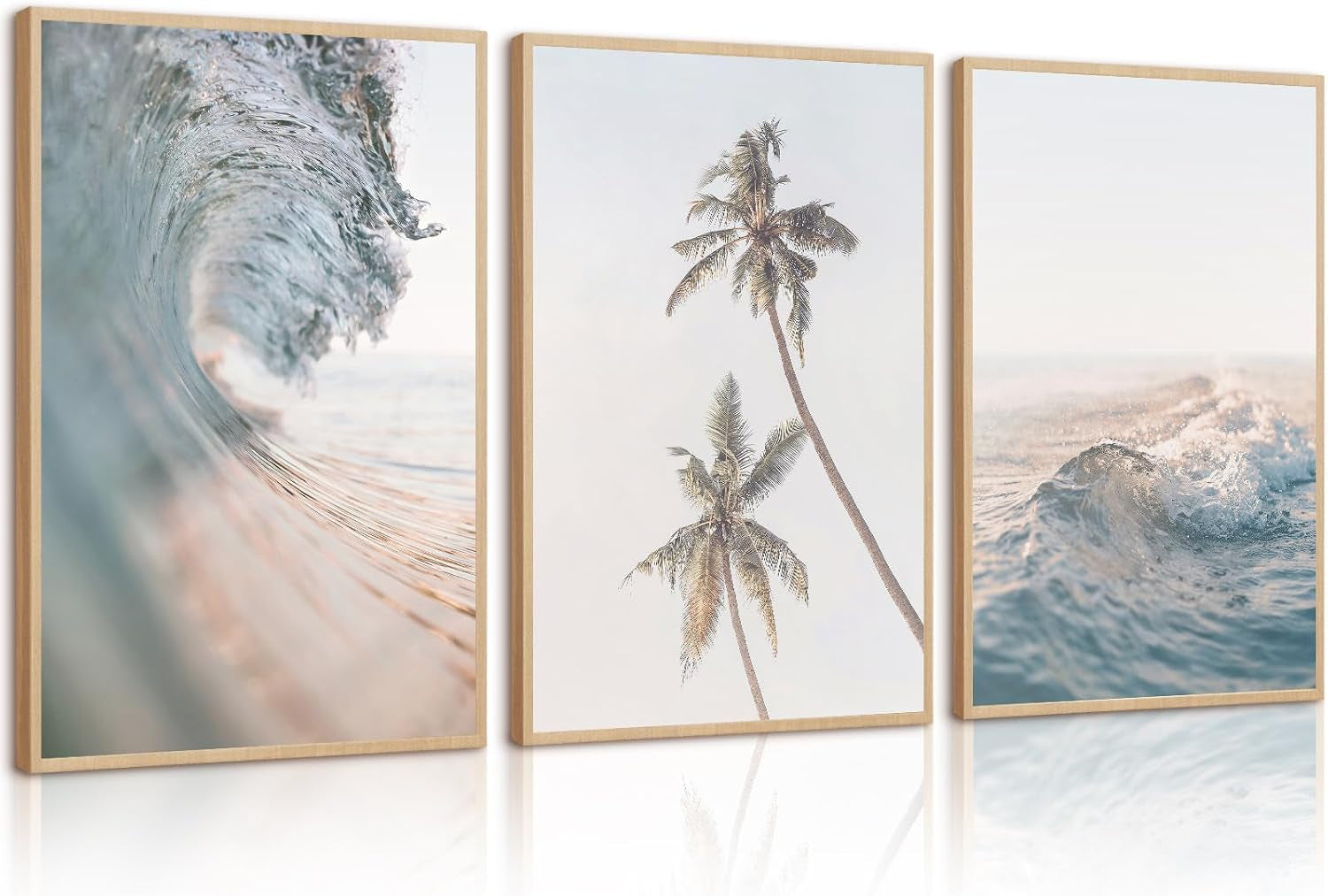 Three vertical framed beach prints in light wood frames: curling wave, tall palm trees, and a distant wave.
