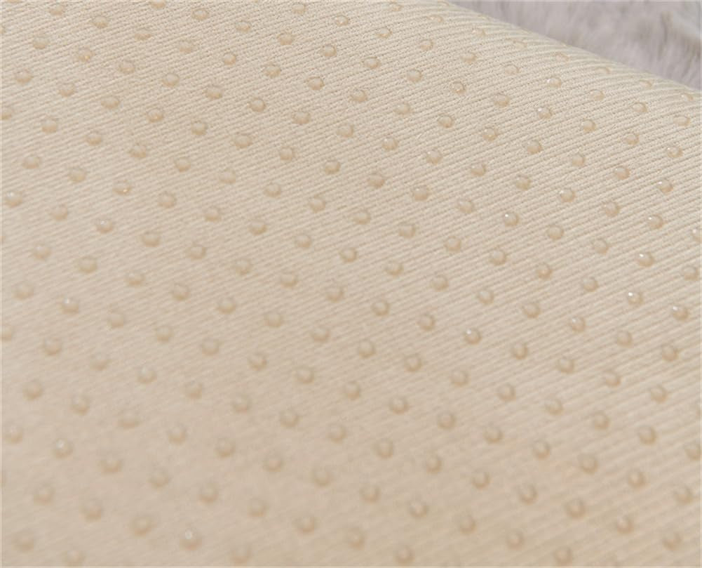 Beige anti-slip silicone dot backing close-up showing textured grip on underside of slipcover
