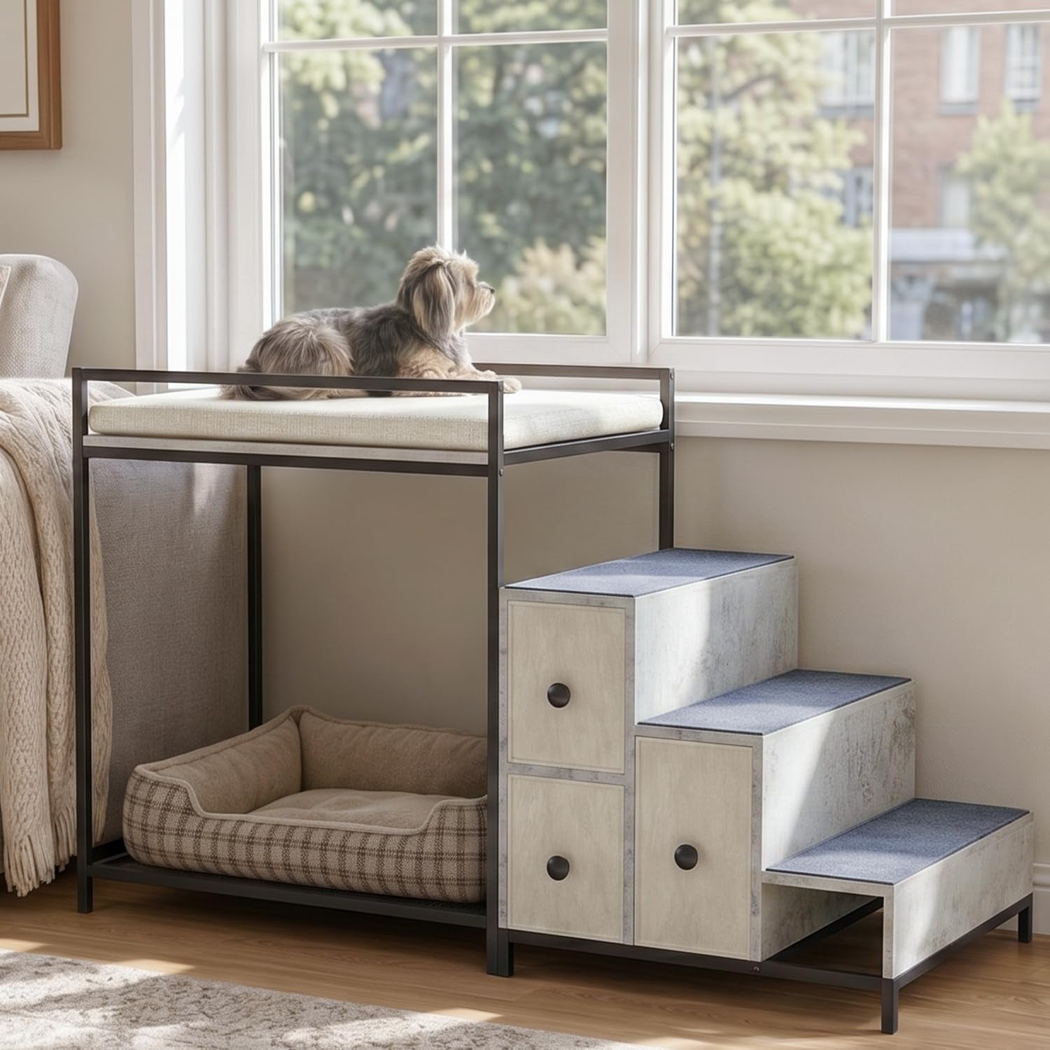 Two-level pet bed beside a window with a light top cushion and carpeted stairs featuring storage drawers