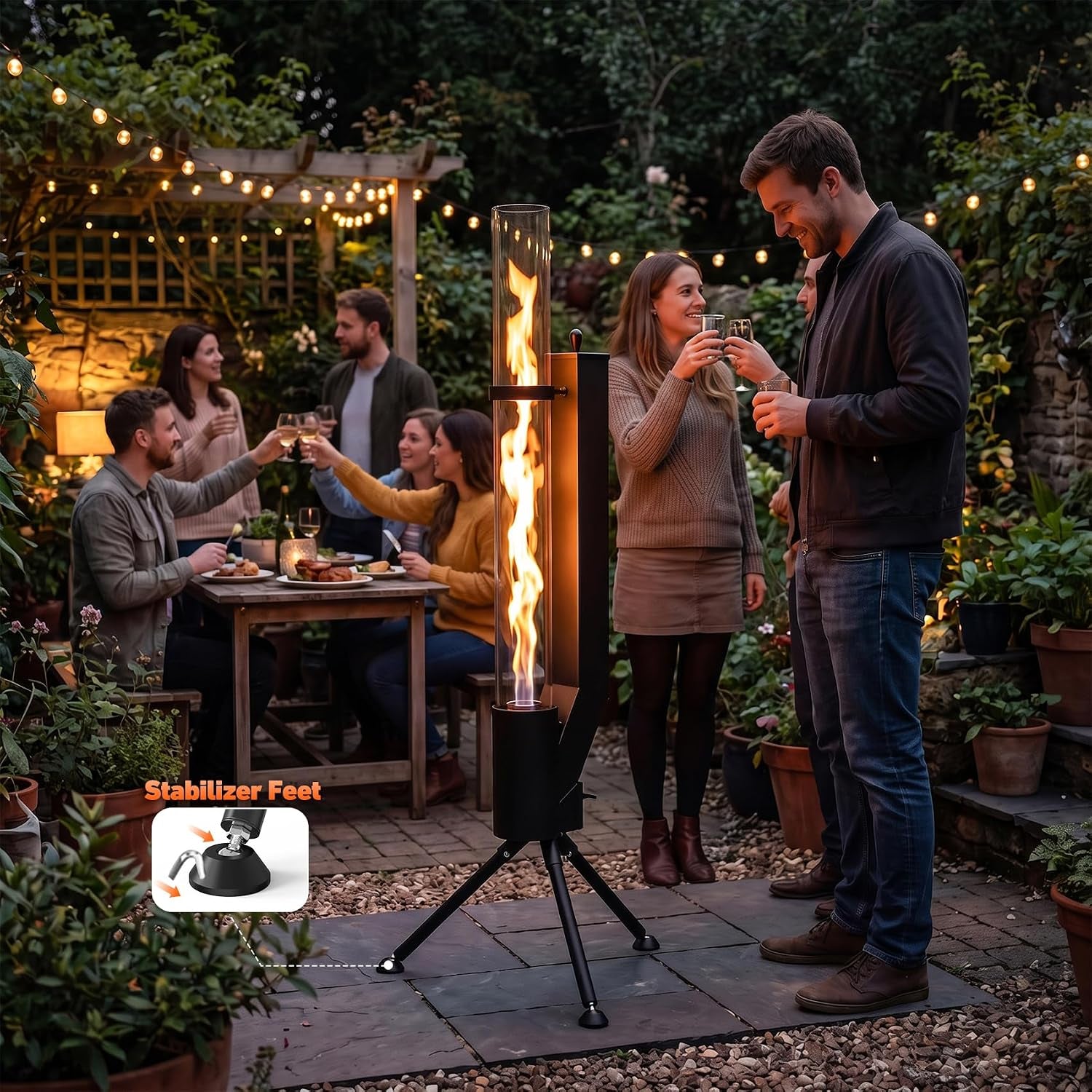 Glass-tube heater glowing at night on a tripod while a group socializes; inset shows a stabilizer foot detail.