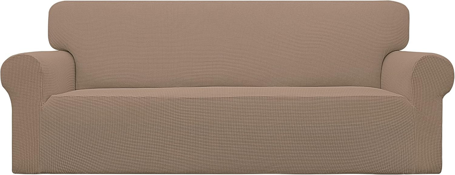 Full-width front view of a warm brown textured loveseat cover with rounded arm shapes and subtle knit pattern.