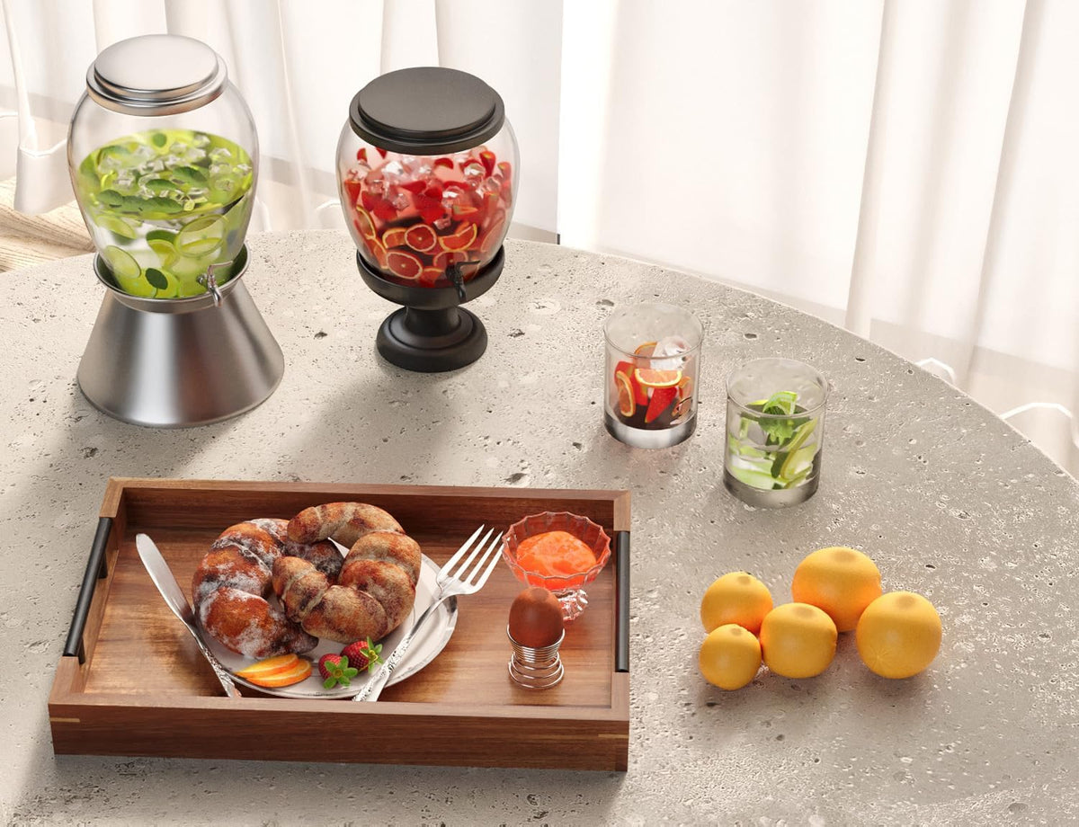 Brown acacia serving tray with black handles used to serve breakfast on a stone table with fruit nearby