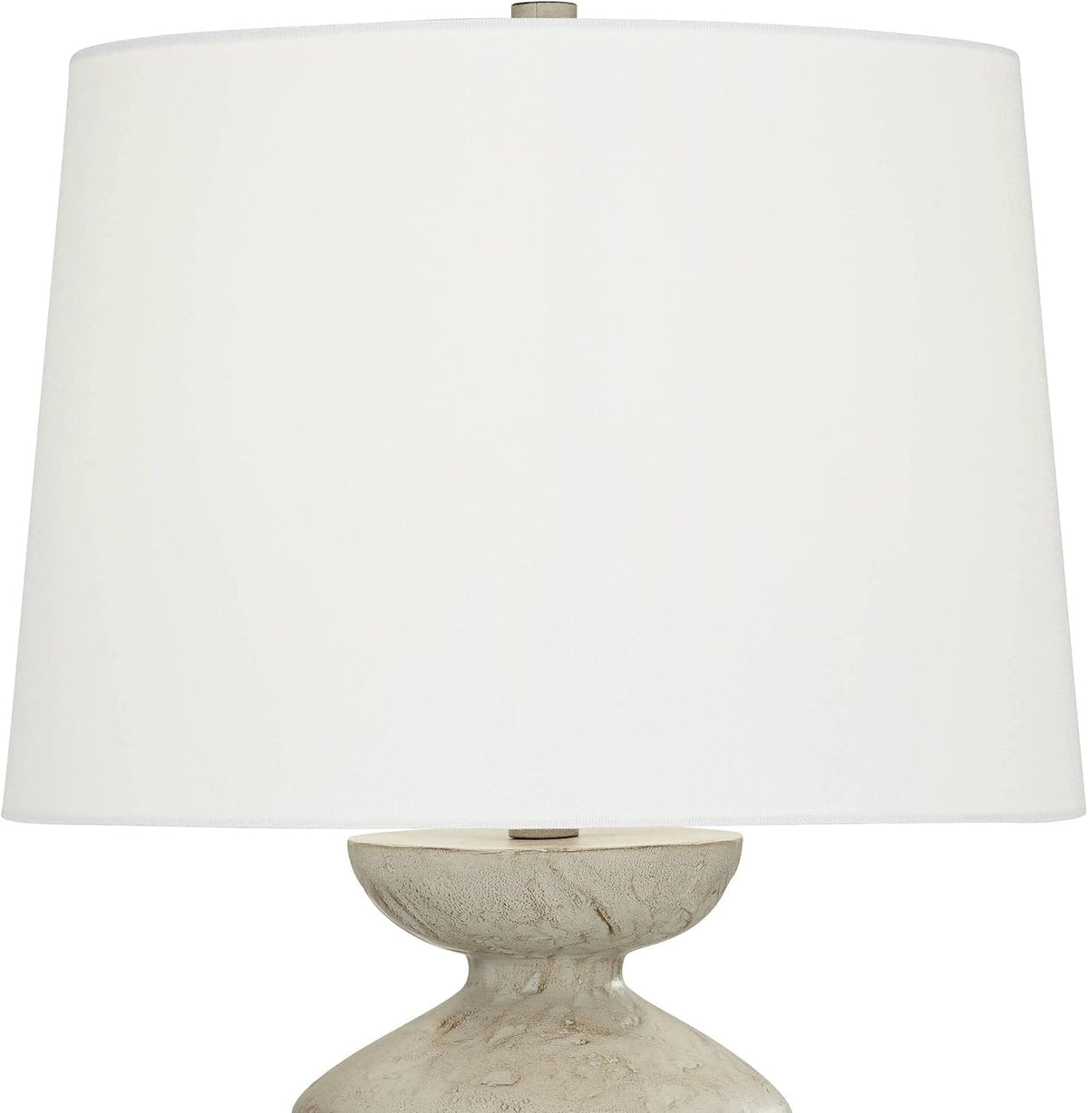 Upper lamp showing white drum shade and the rounded top of the sculptural grey base beneath it