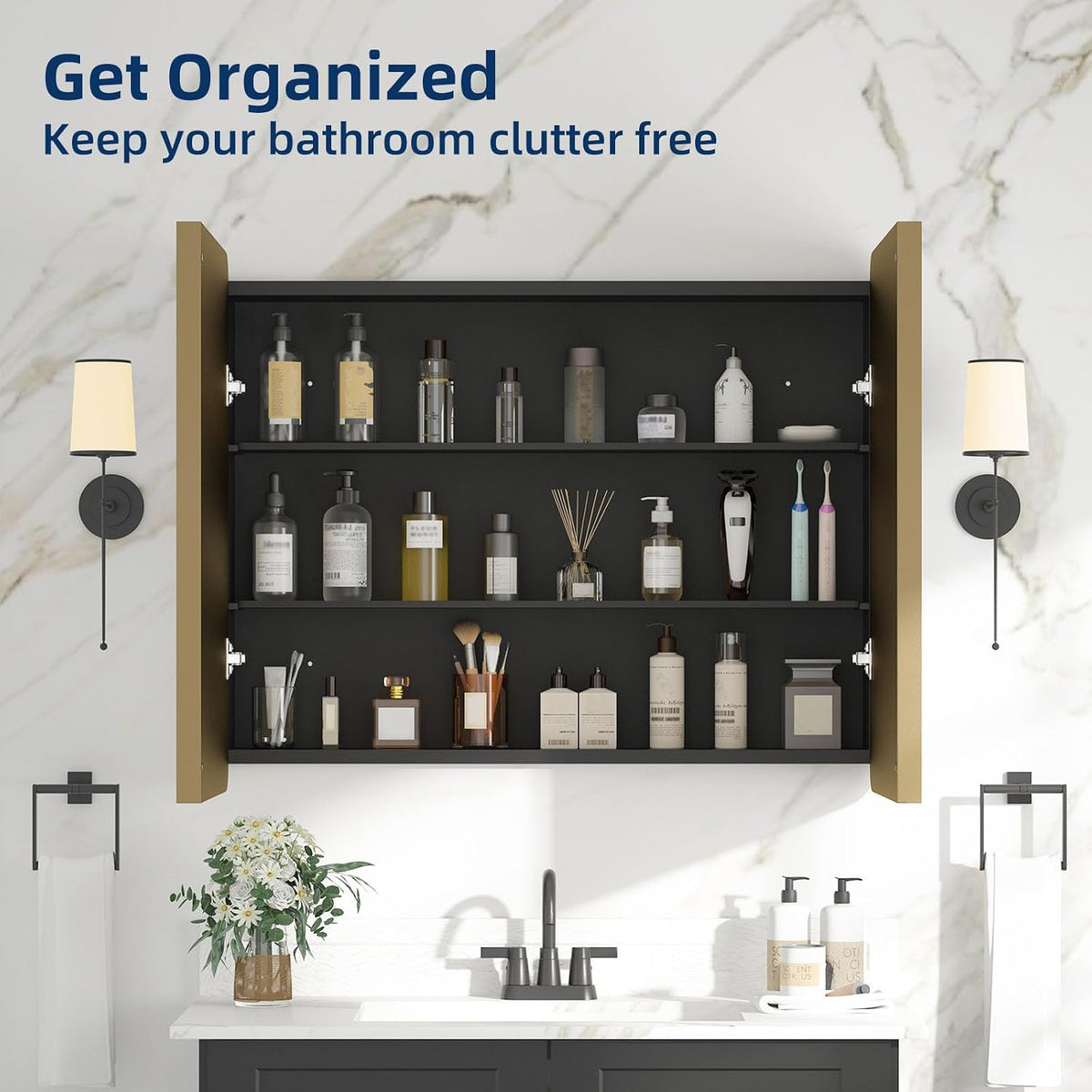 Gold-framed wall cabinet with both doors open showing three interior shelves stocked with toiletries.