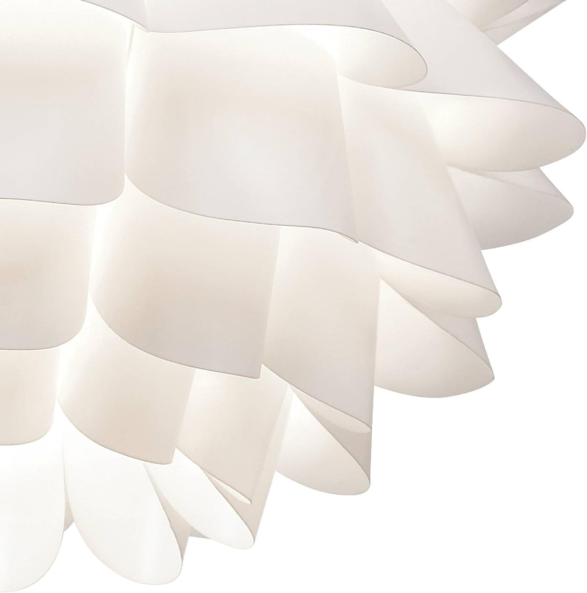 Tight close-up of the pendant's layered white resin petals and smooth rounded edges