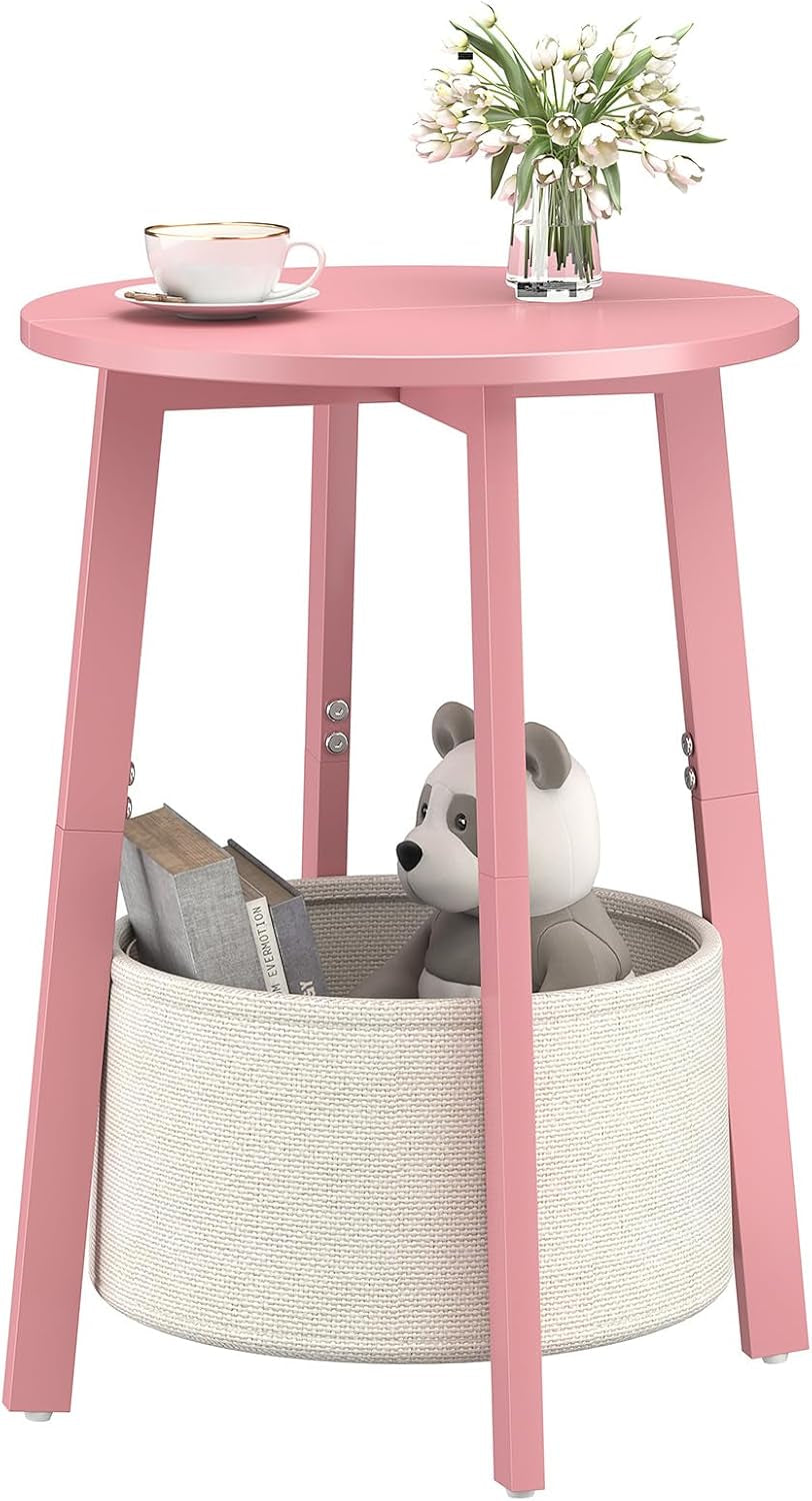 Round pink side table with lower cloth storage basket holding books and a teddy bear