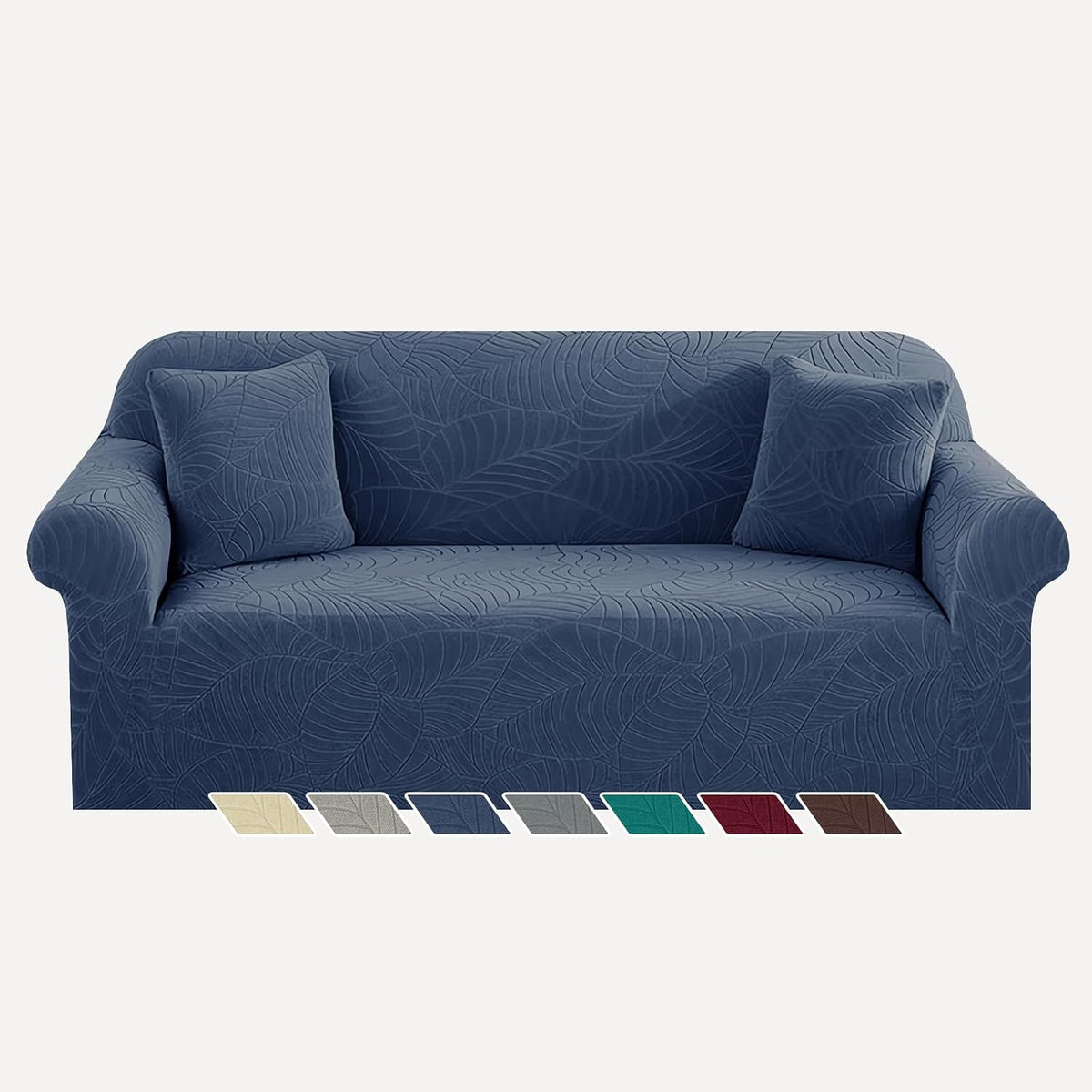 Front view of a three-seat sofa in deep blue leaf-pattern stretch cover with two matching square pillows and color swatches