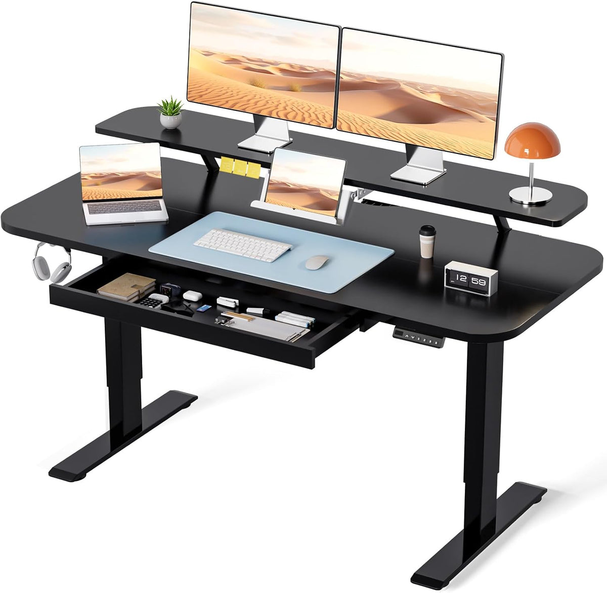 Black standing desk on a white background with raised shelf, open drawer filled with office items and control panel visible.