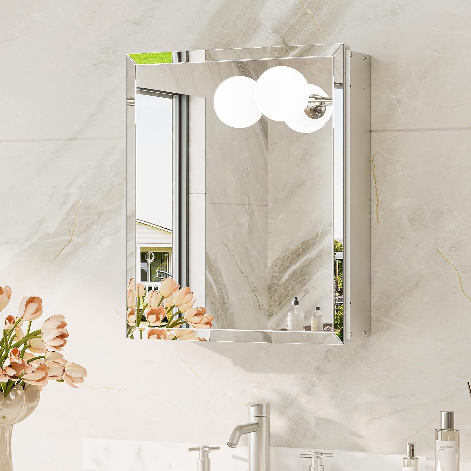 Angled view of the recessed mirrored cabinet showing its depth and reflections of a bathtub.