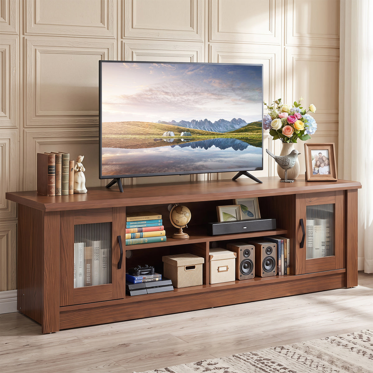 Brown wood-grain TV stand with fluted doors and open shelves beneath a television in a paneled living room.