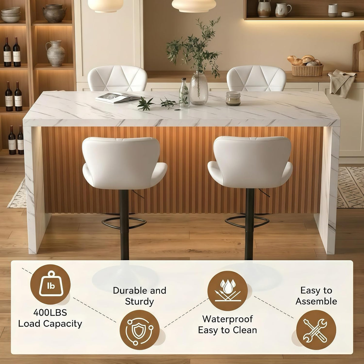 Front view of white faux-marble island table with brown fluted front and two white bar stools.