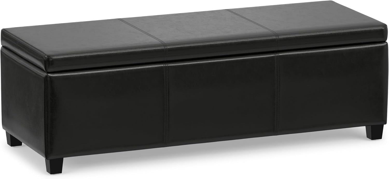 Three-quarter front view of a black rectangular lift-top storage ottoman with stitched top panels.