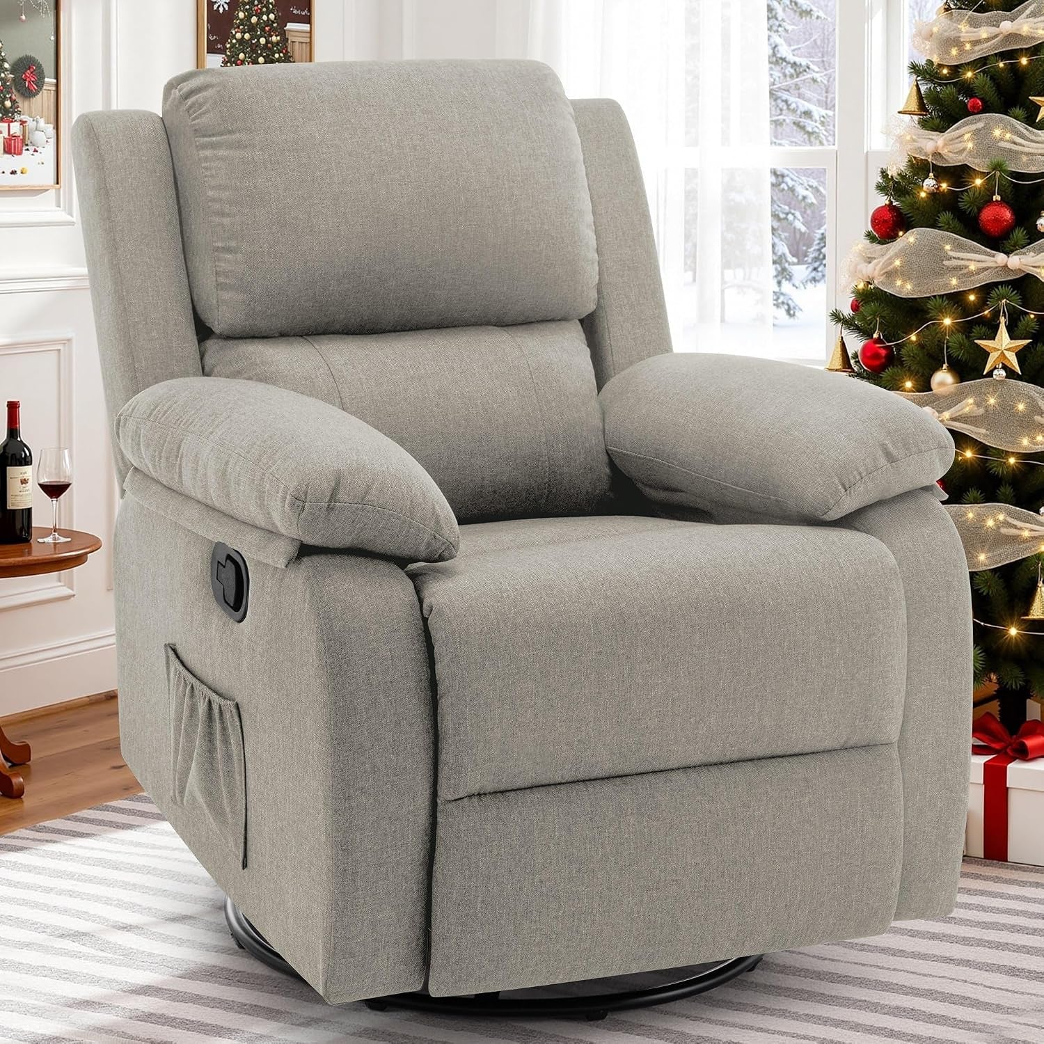 Light gray upholstered swivel recliner in a living room beside a decorated Christmas tree and small side table