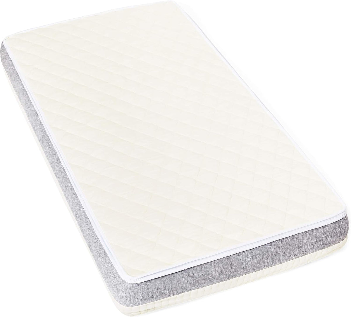 Angled top-down view showing the mattress surface and gray fabric side panel with rounded corners
