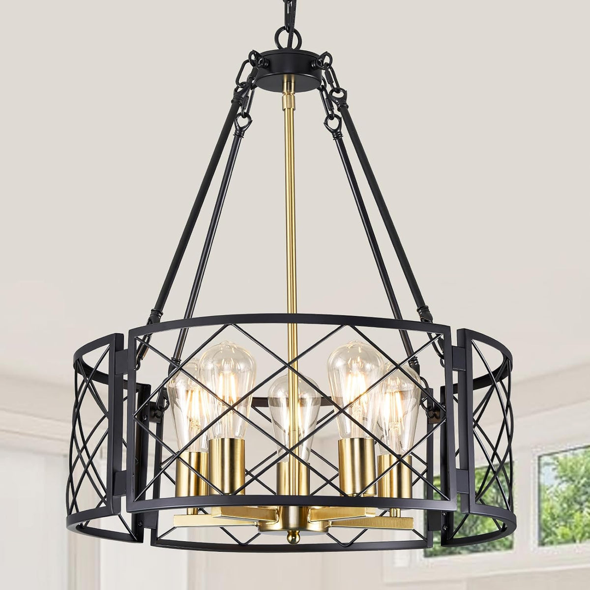 Upper view of the fixture showing black hanging chains, a gold central rod and a black crisscross metal shade with exposed