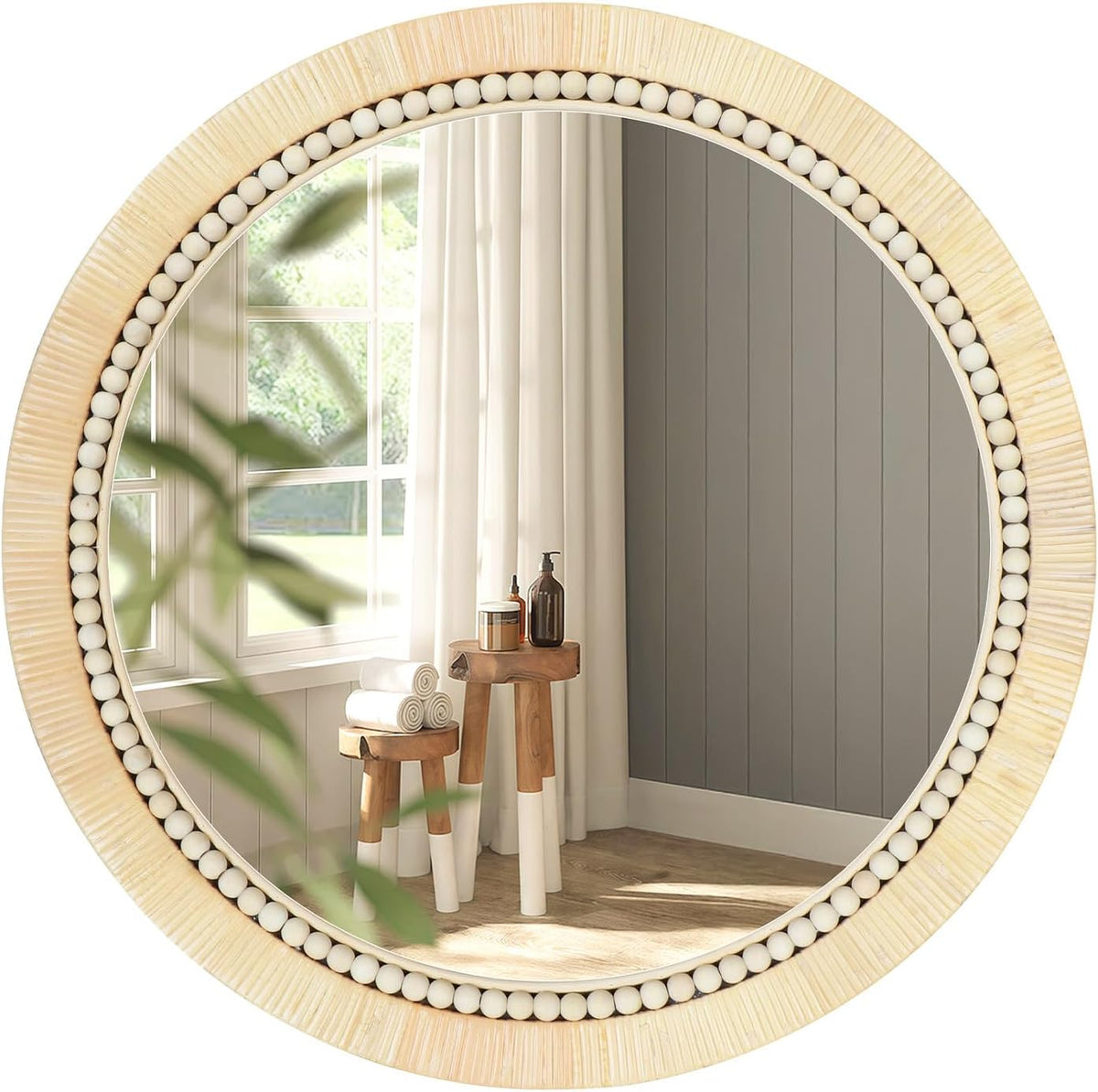 Close-up front view of a round rattan mirror showing the wooden bead trim and clear glass reflection
