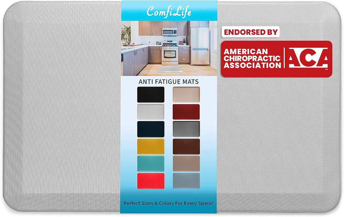 Silver-gray rectangular standing mat shown with packaging label down the center and a red endorsement badge to the right