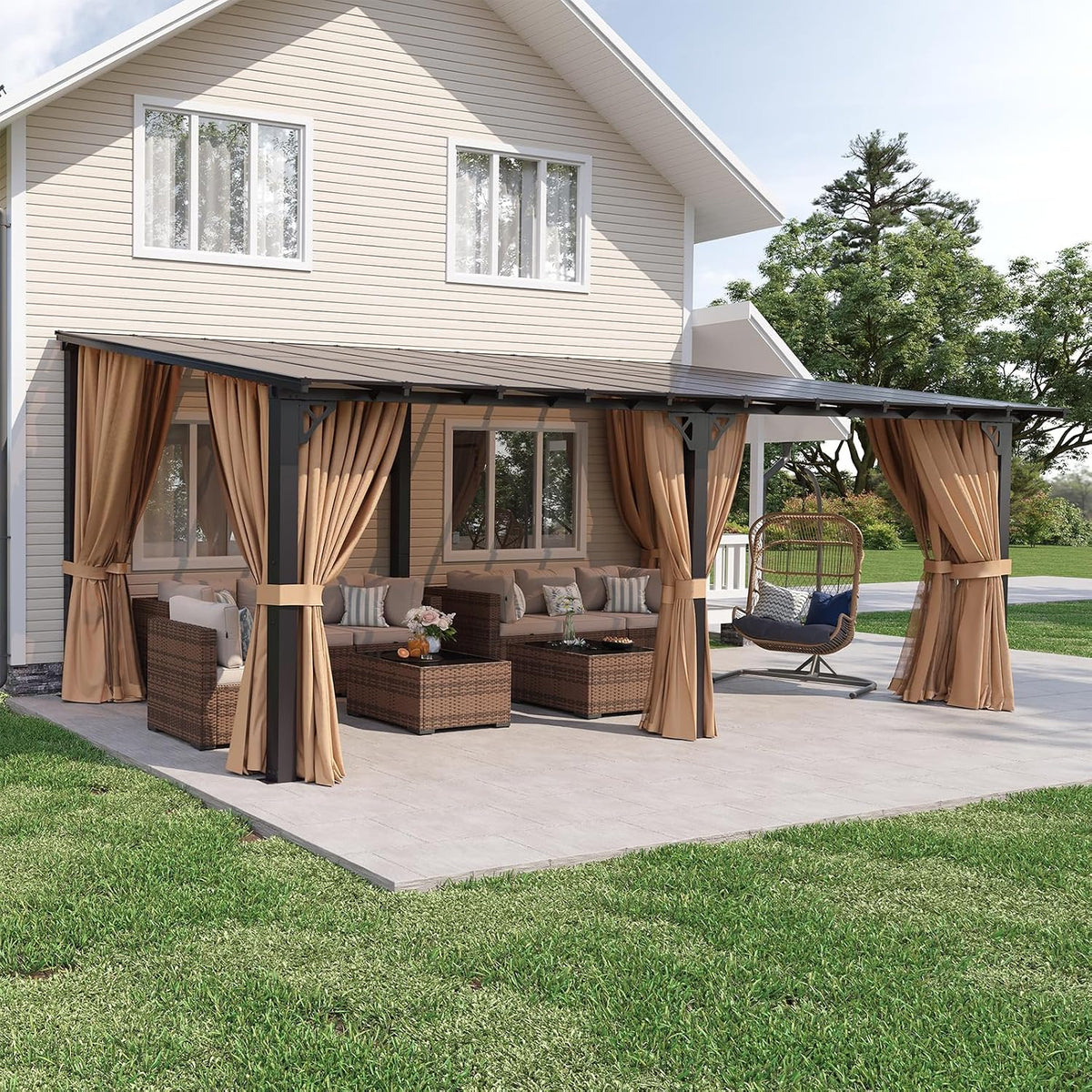 Wide exterior shot showing the full attached pergola, paved patio edge and lawn in the foreground with furniture beneath.