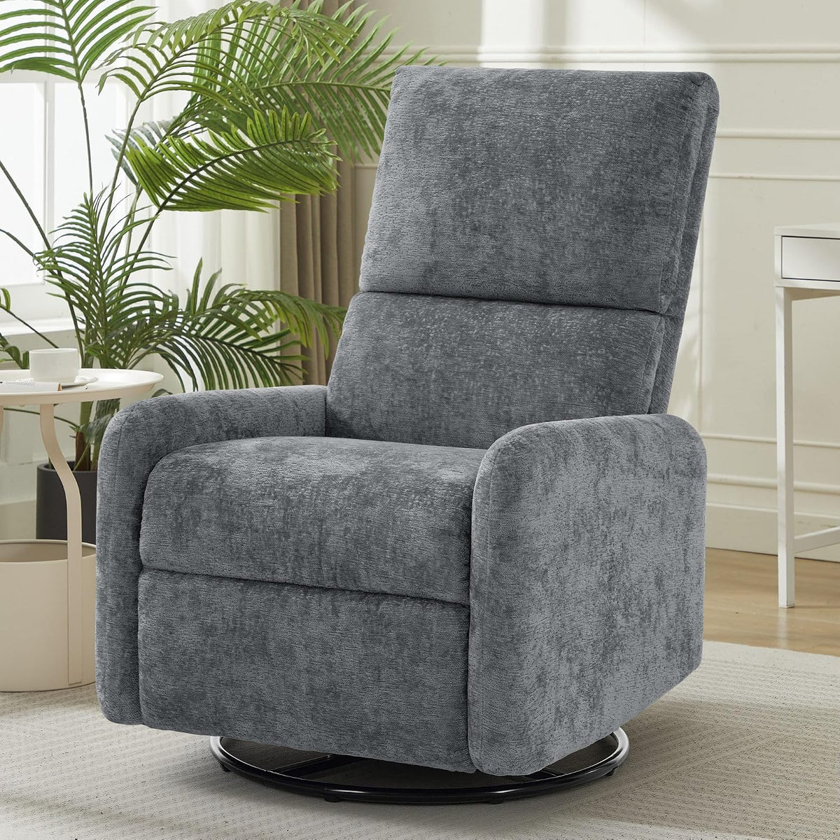 Gray swivel glider chair shown in a light room from the front