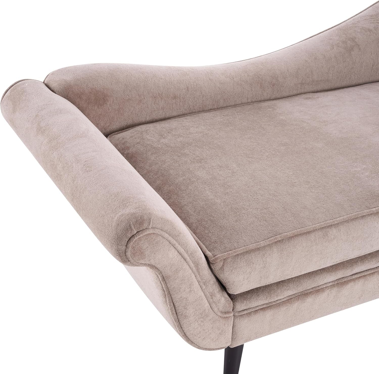 Close-up of the chaise's rolled arm and seat cushion in light brown velvet upholstery.