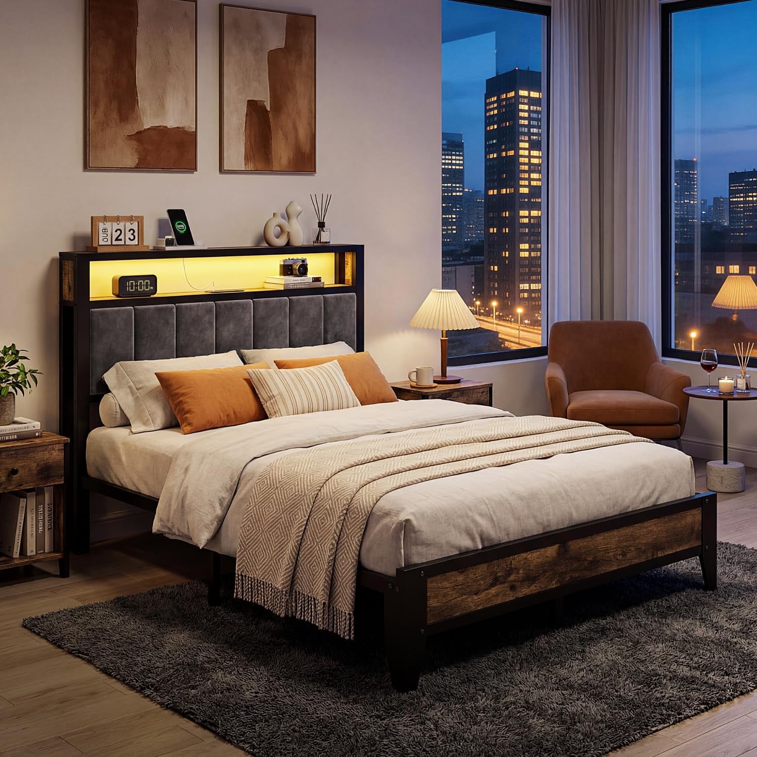 Nighttime bedroom scene showing the bed with warm shelf lighting in the headboard and city skyline visible through windows.