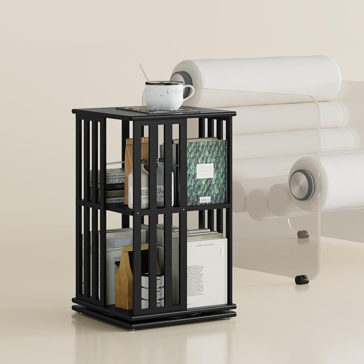 Small black two-tier version used as a side table with a mug and books on its shelves.