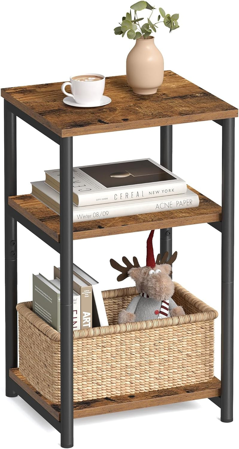 Three-tier small side table with rustic brown shelves and black steel frame showing top and middle shelf with decor