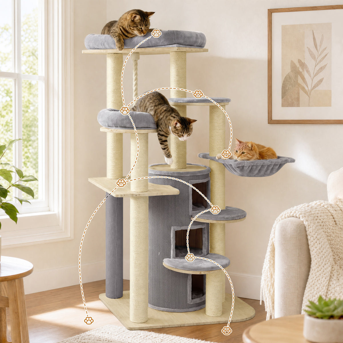 Three cats perch on different levels of a tall cat tree with platforms, cubbies, and a hammock.