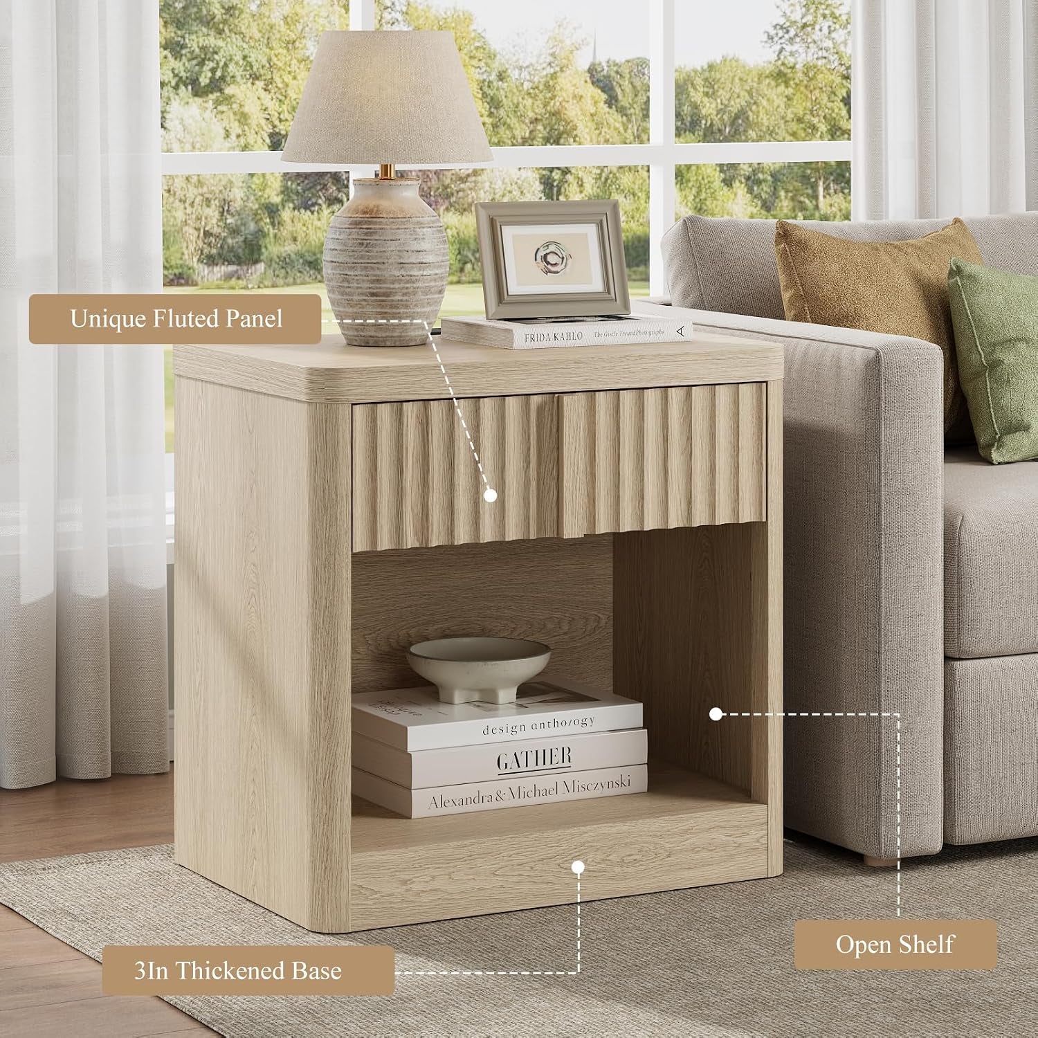 Close view of nightstand highlighting the unique fluted front panel, open shelf and thickened base