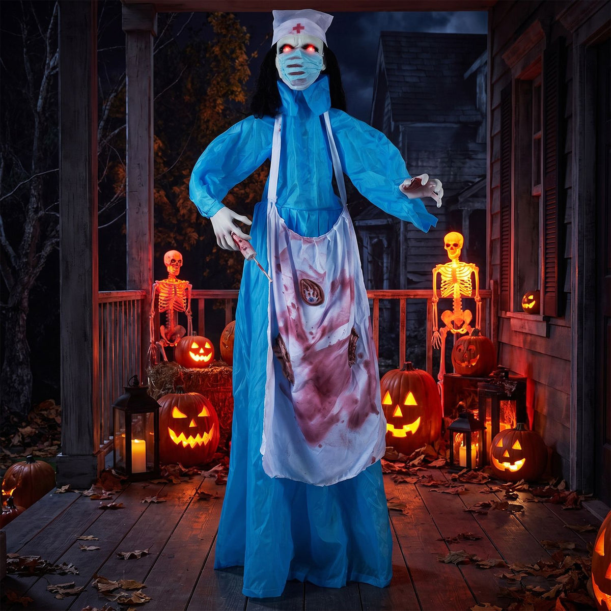 The zombie nurse stands on a porch surrounded by glowing pumpkins and two illuminated skeletons.