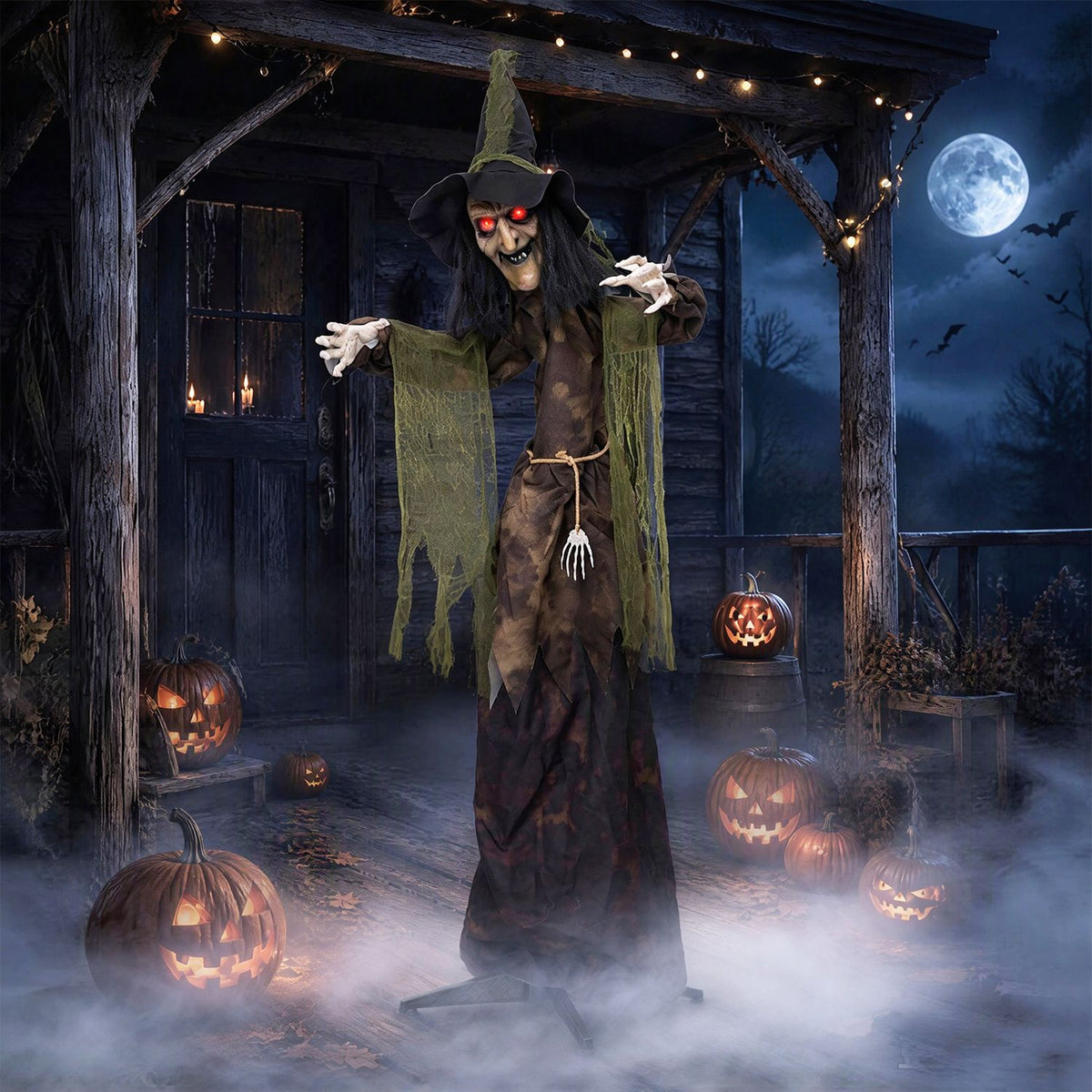 A red-eyed witch with outstretched arms stands among glowing pumpkins on a foggy porch at night.